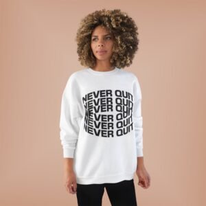 A women wearing a white sweater with the words never quit on the front